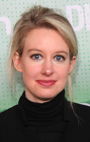 Grifter Elizabeth Holmes, seen here sporting a black turtleneck sweater to add some Silicon Valley credibility to her gruff.