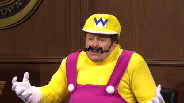 Screenshot of Elon Musk playing Super Mario in a Saturday Night Live skit - intended to portray him as an idiot?