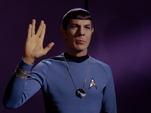 A photograph of Mr Spock giving the Vulcan salute.