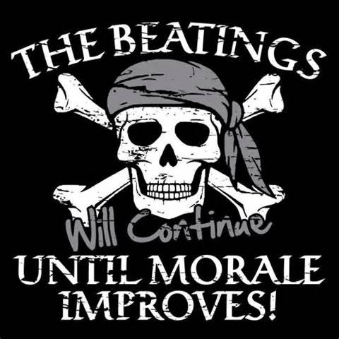 A skull-and-crossbones image is in the center.  The skull has a kerchief tied around its head, pirate-style.

Top text:  The beatings

Mid text:  Will Continue

Bottom text: Until Morale Improves!