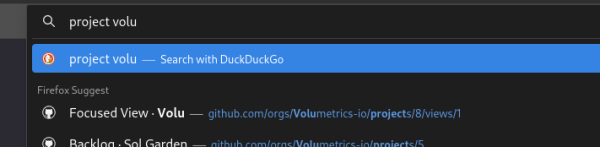 A close screenshot of Firefox's URL bar, with "project volu" entered. The suggestion list shows the 'search with DuckDuckGo first', with past visits to github links below.