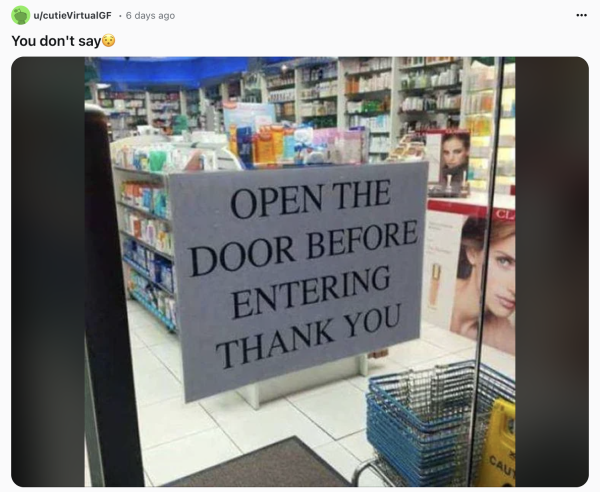 A post on reddit showing a door with a sign that says "Open the door before entering. Thank you."
